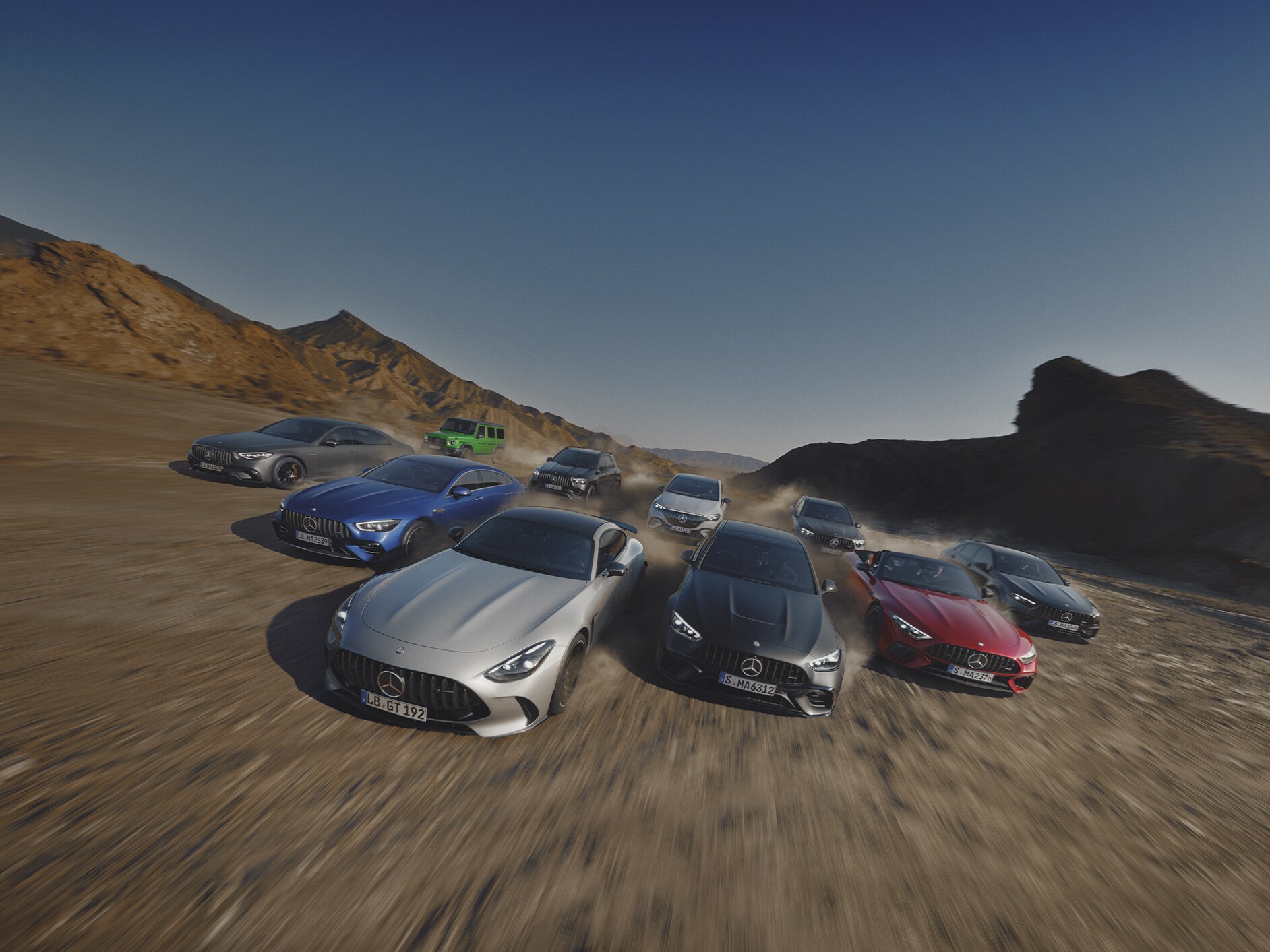 Front view of several Mercedes-AMG vehicles.