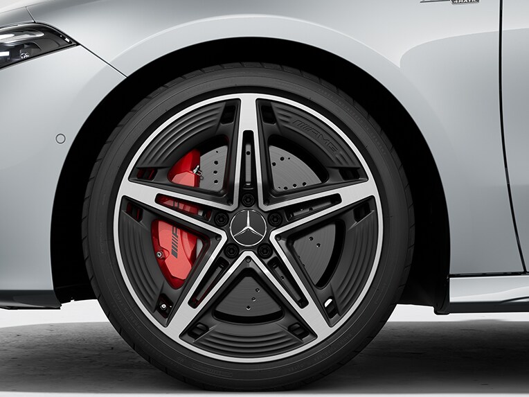 The exterior of the Mercedes-AMG A-Class Saloon with red-painted brake callipers.