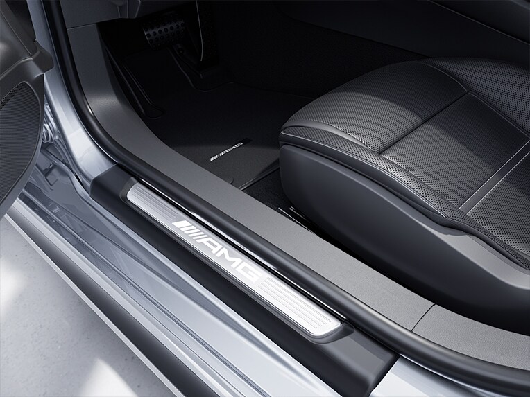 The AMG illuminated door sills with "AMG" lettering and with exchangeable cover in the new Mercedes-AMG GT 63 S E PERFORMANCE.