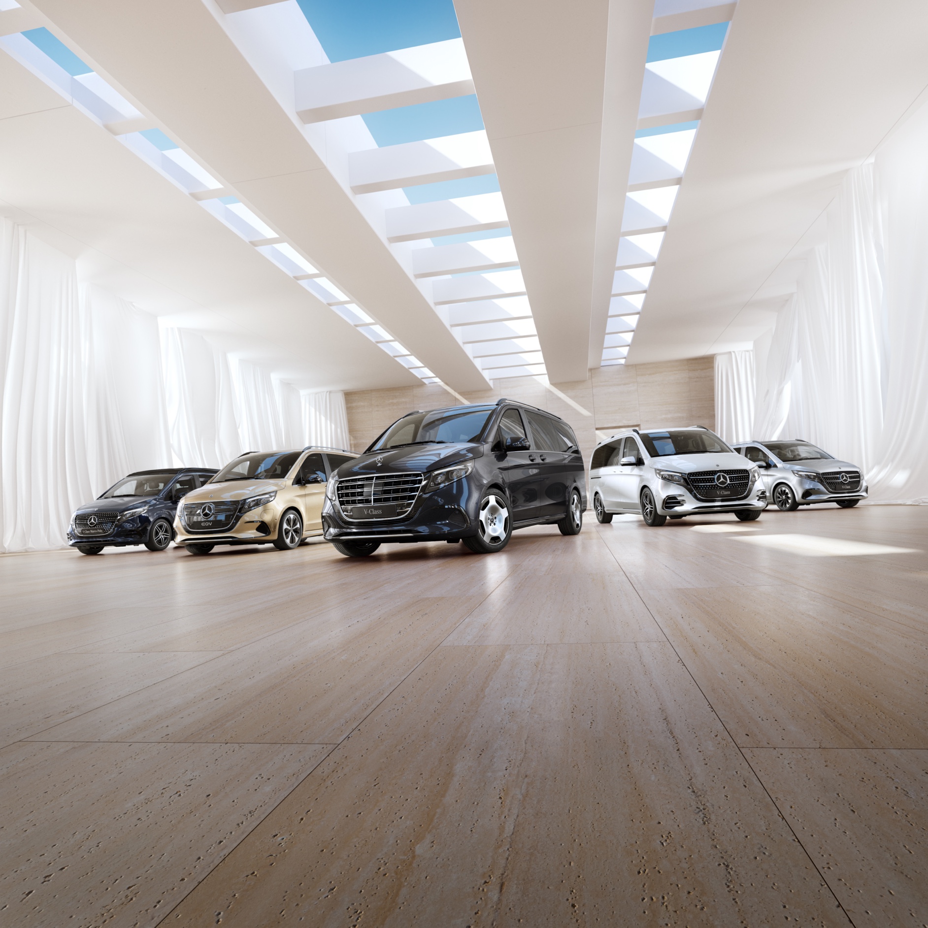 Comfort | EQV | Mercedes-Benz Vans The Mercedes-Benz Van and Camper models are in a showroom.