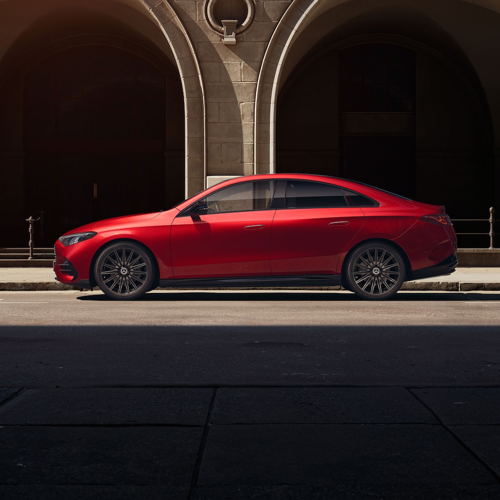 Frontal side view from a slightly elevated perspective because of the panoramic roof of the Mercedes-Benz CLA C174.