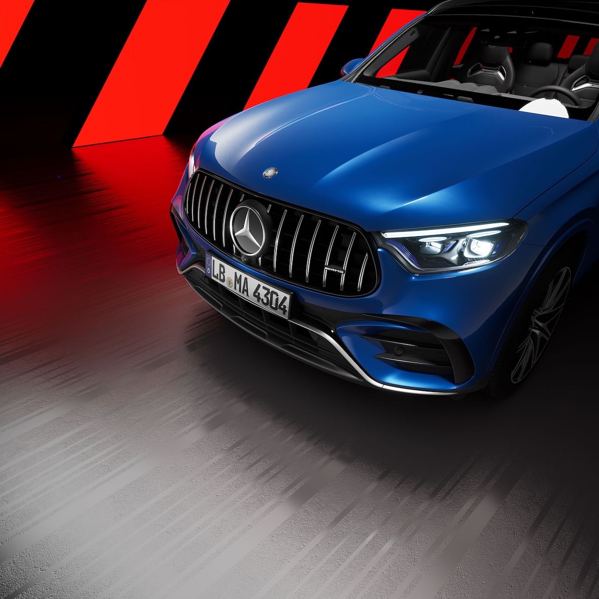 Side view on the front section of an Mercedes-AMG GLC SUV with AMG Exterior Night Package.
