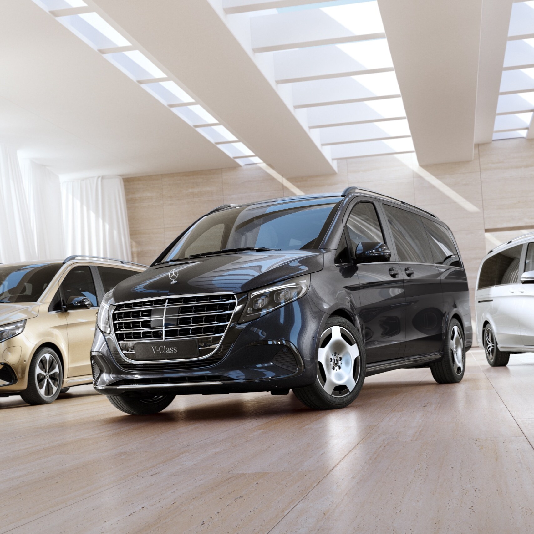 The EQV, V-Class and V-Class Marco Polo from Mercedes-Benz on display in a room shrouded with curtains.