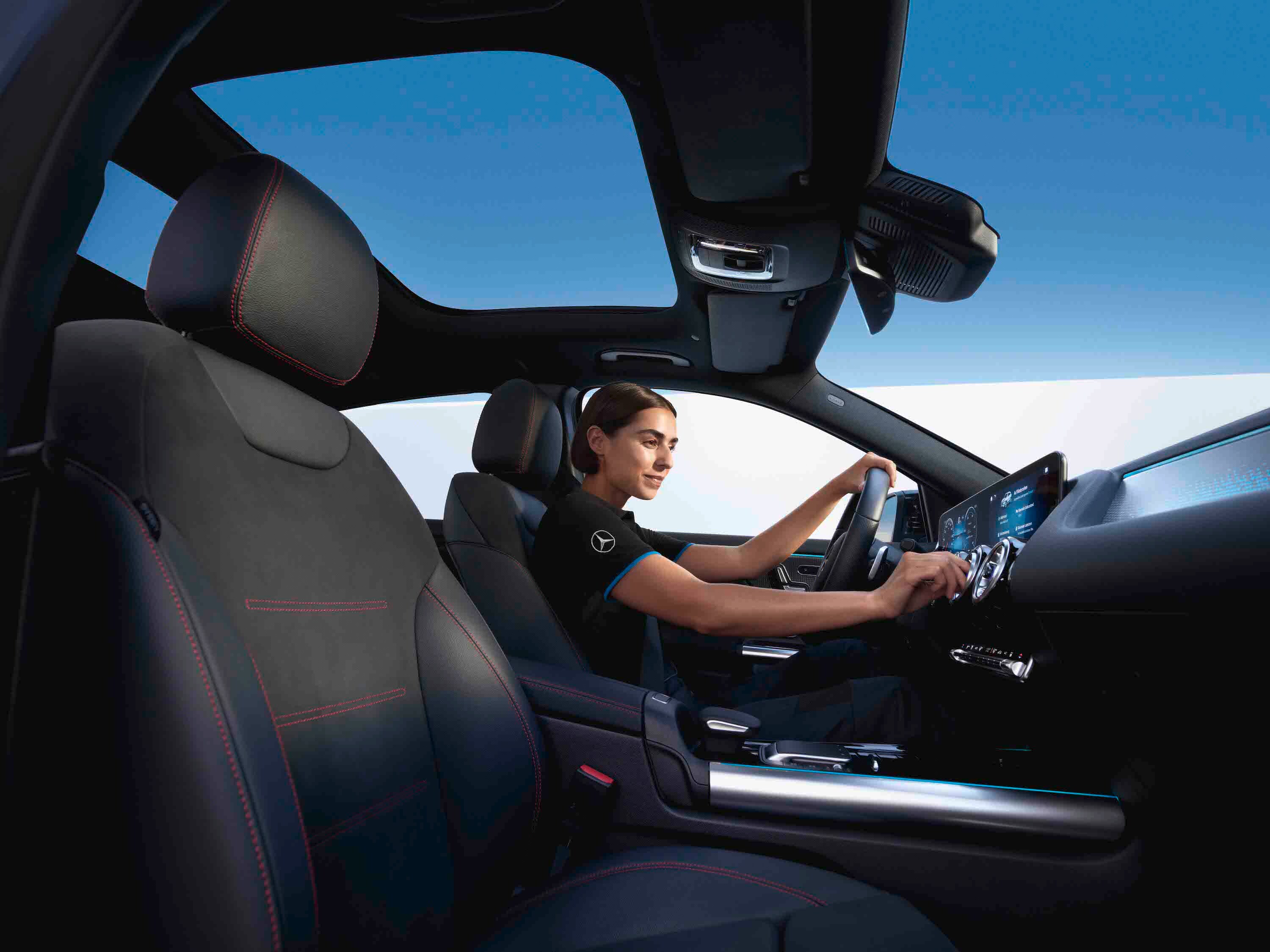 A Mercedes-Benz technician checks the interior air filter.