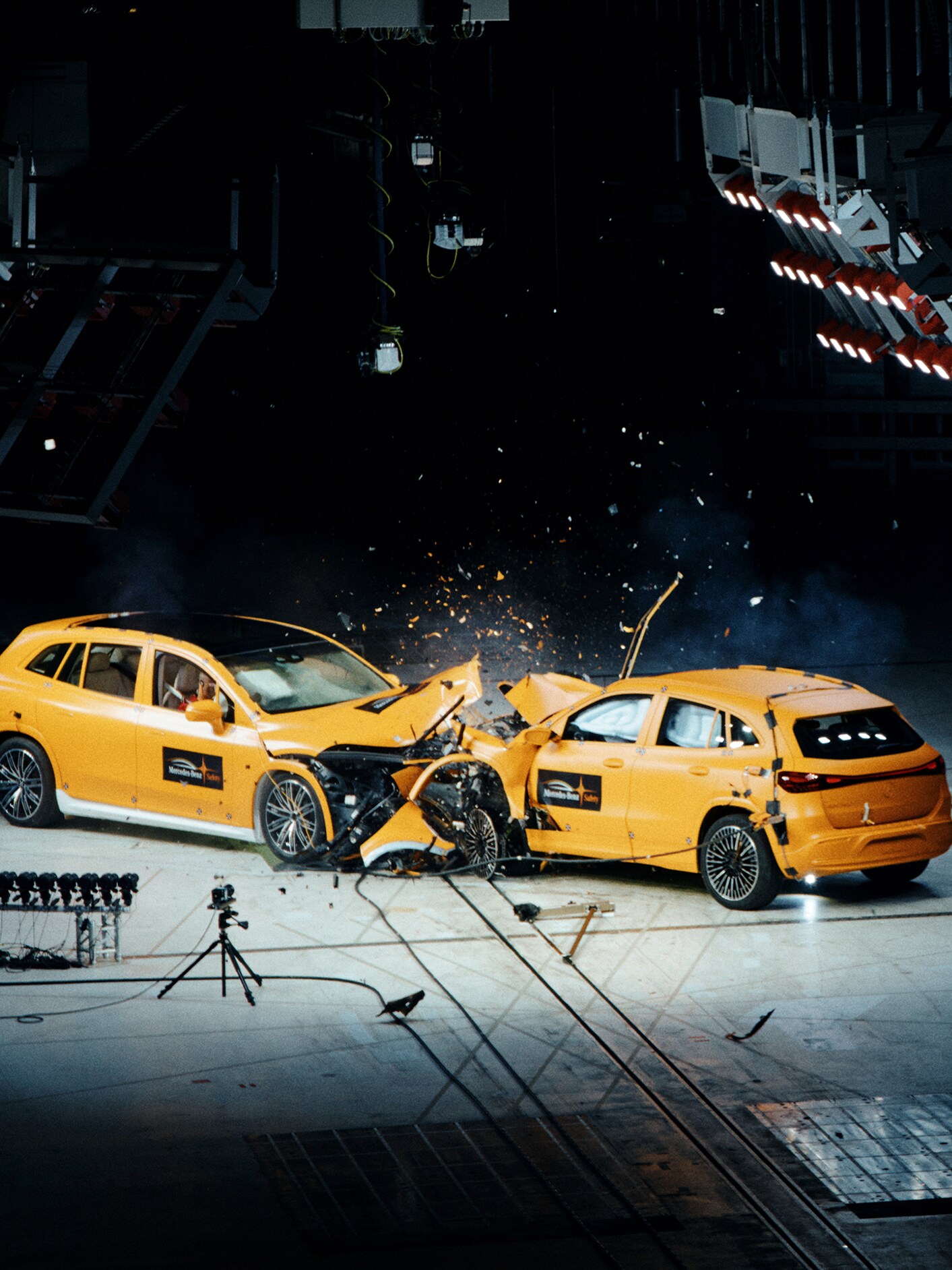 Frontal crash between two Mercedes-Benz cars captured by crash test cameras.