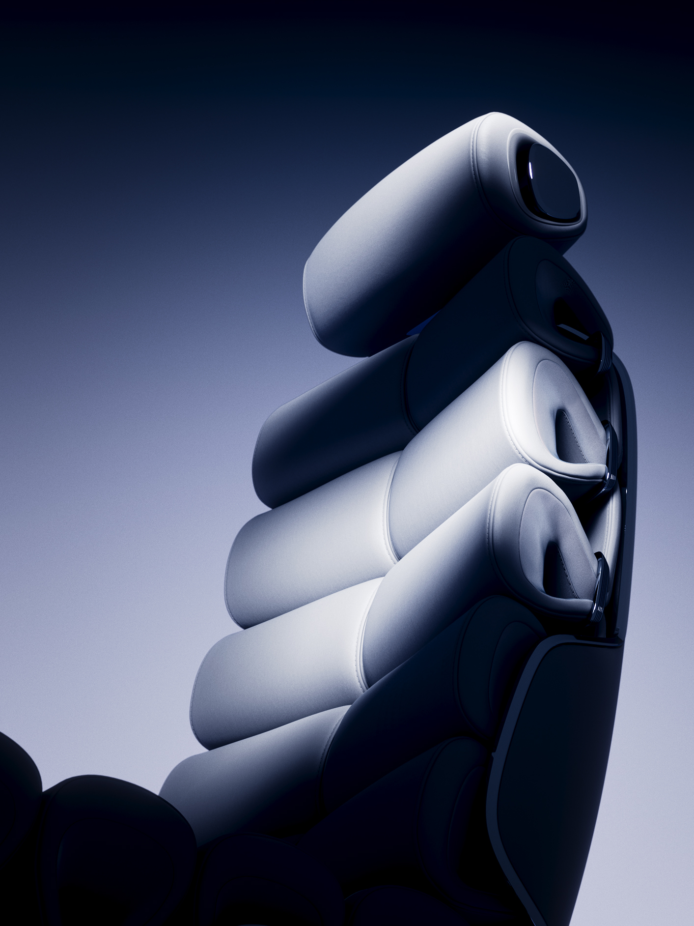 Reclining seats | Vision V | Mercedes-Benz The two luxurious seats in the rear passenger compartment of the Vision V in a reclining position.