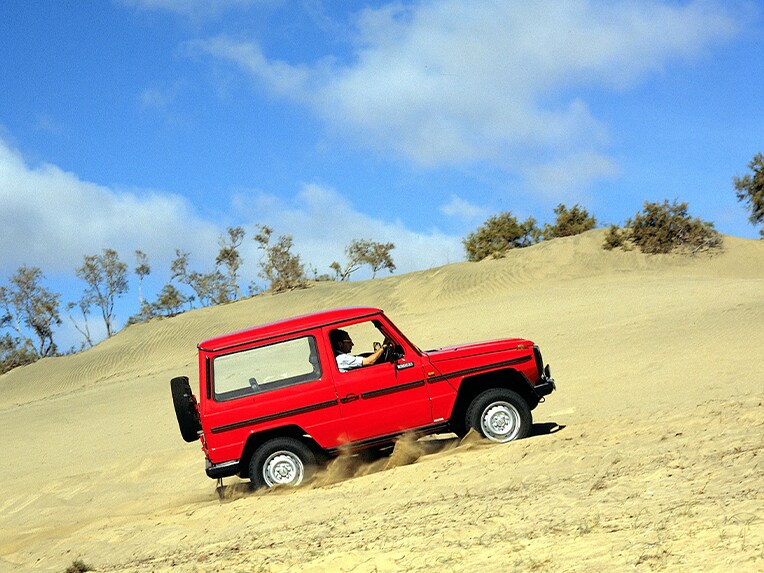 Mercedes-Benz G-Model in a desert.