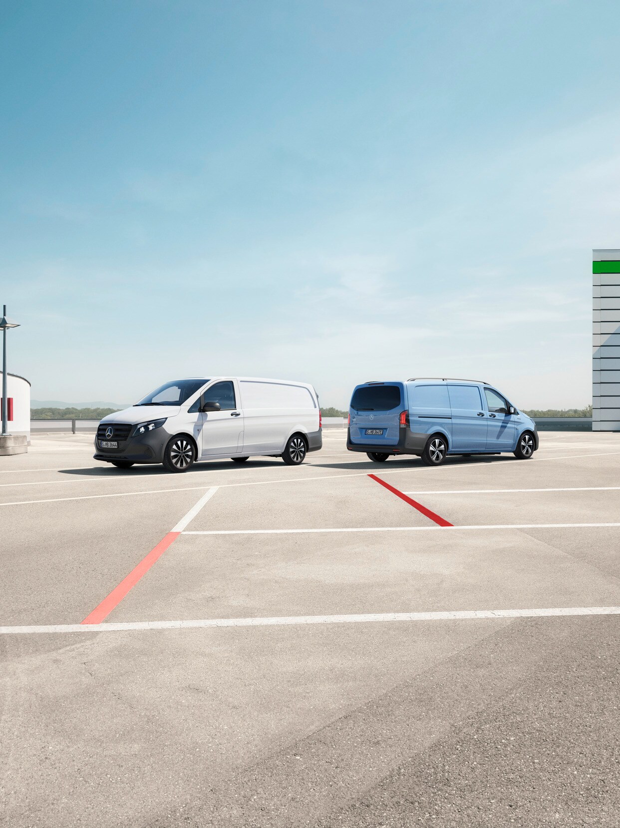 The Vito Panel Van and eVito Panel Van standing in a parking lot.