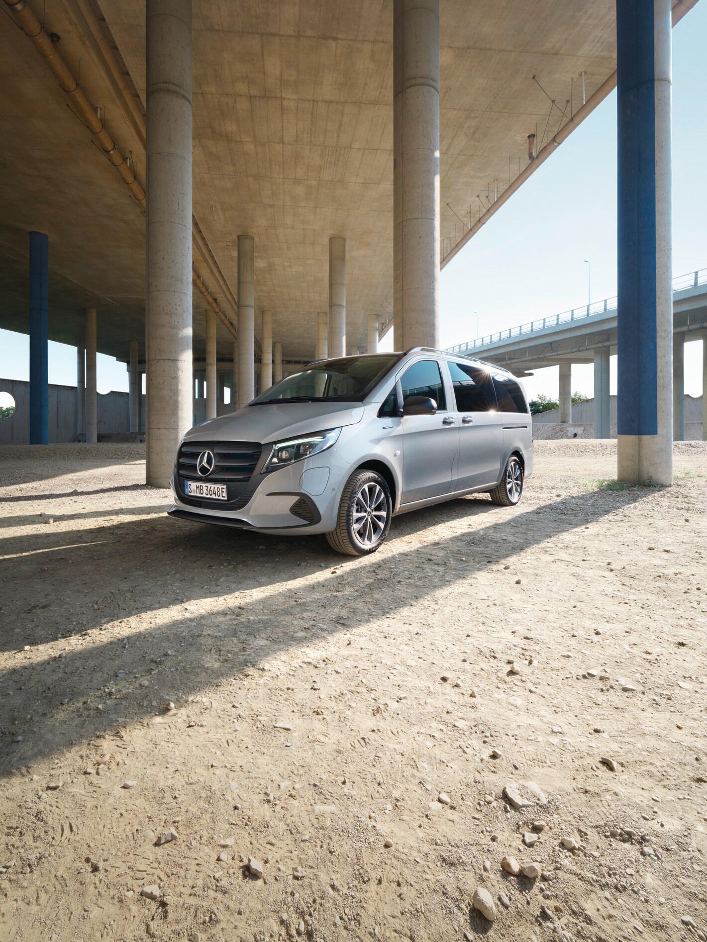 Silver eVito Tourer parked under a bridge.