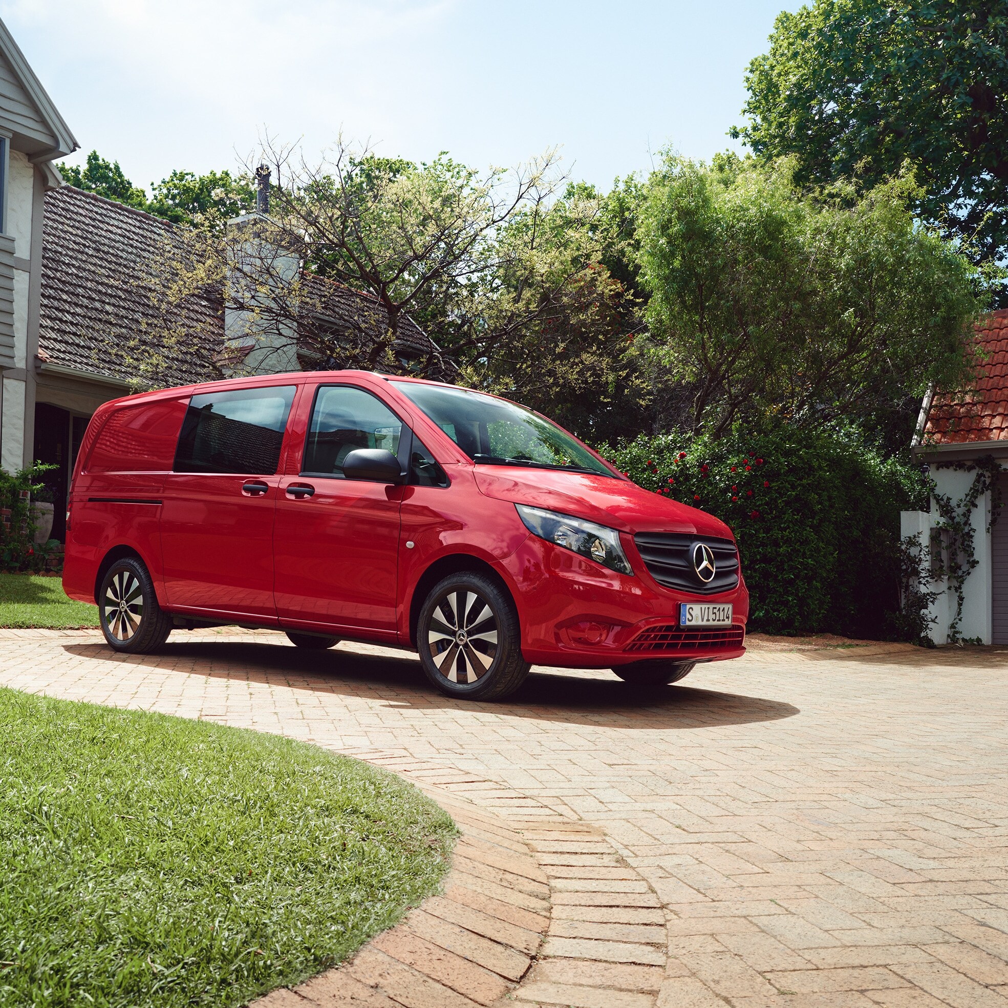Mercedes‑Benz Vito Crew in a residential setting, highlighting versatile passenger and cargo transport in one vehicle.