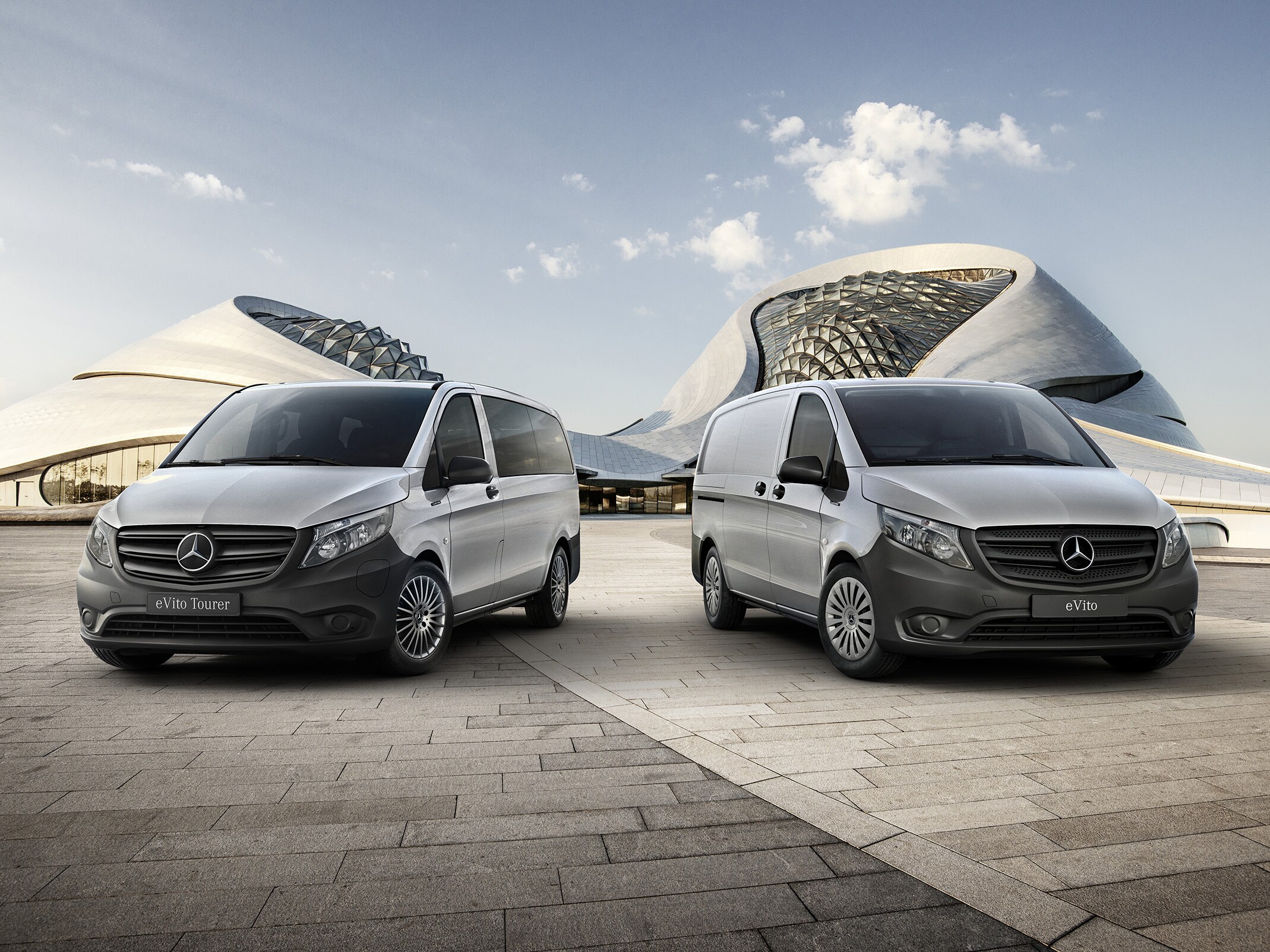 eVito Panel Van and Tourer in front of a futuristic building