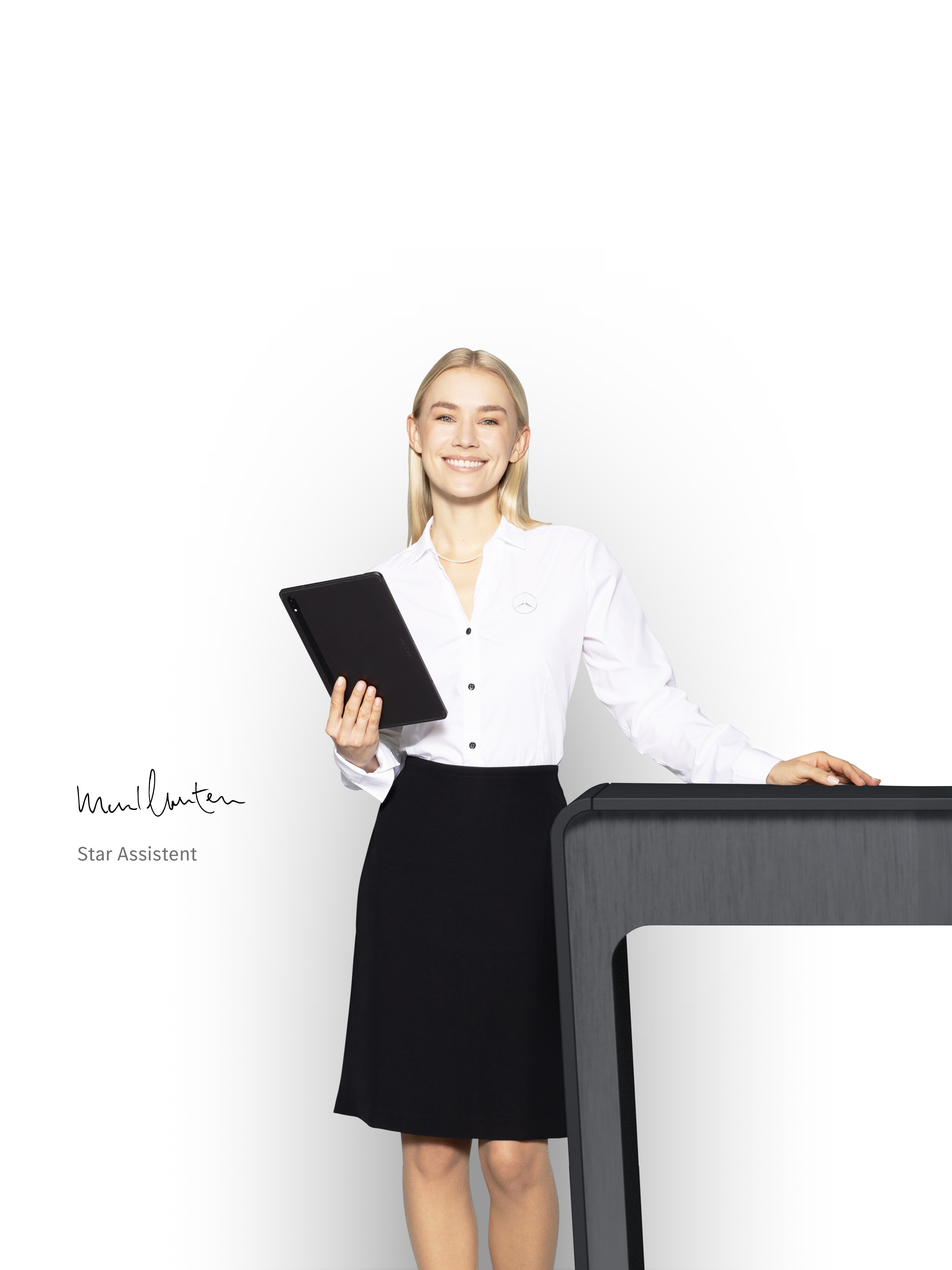 A woman, star assistant, standing with a tablet in her hand to deliver competent support.