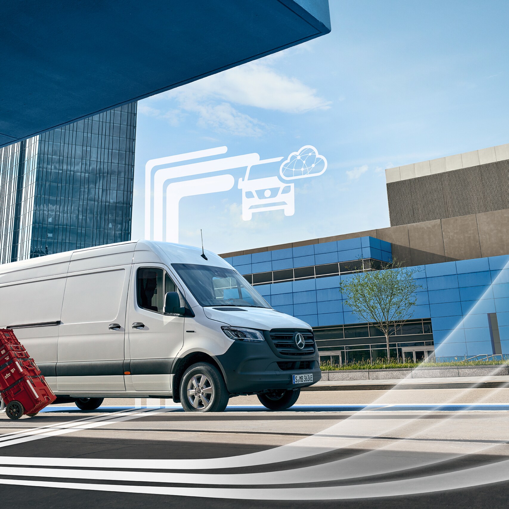 A Mercedes-Benz van with graphic elements representing the Digital Extras.