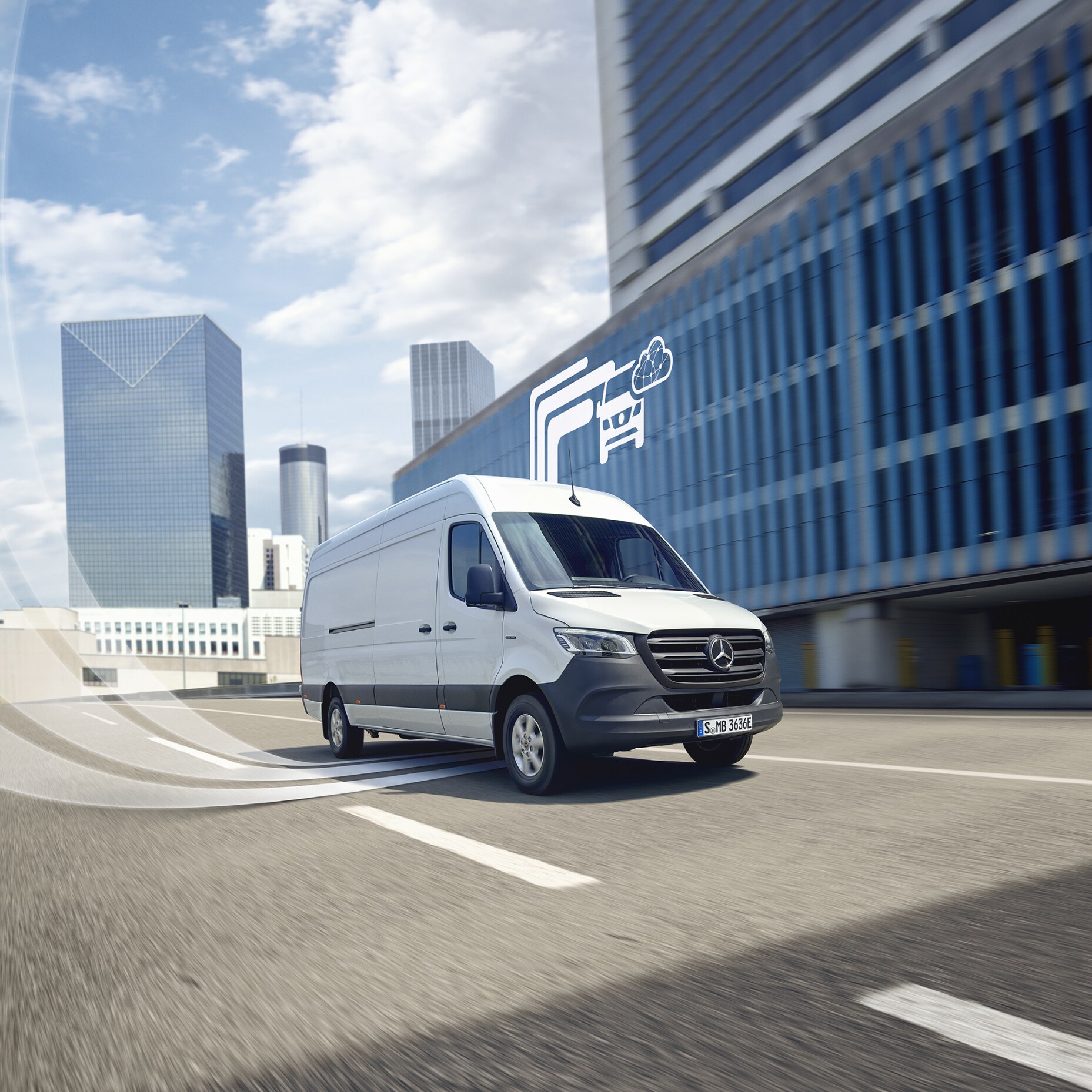 A Mercedes-Benz van with graphic elements representing the Digital Extras.