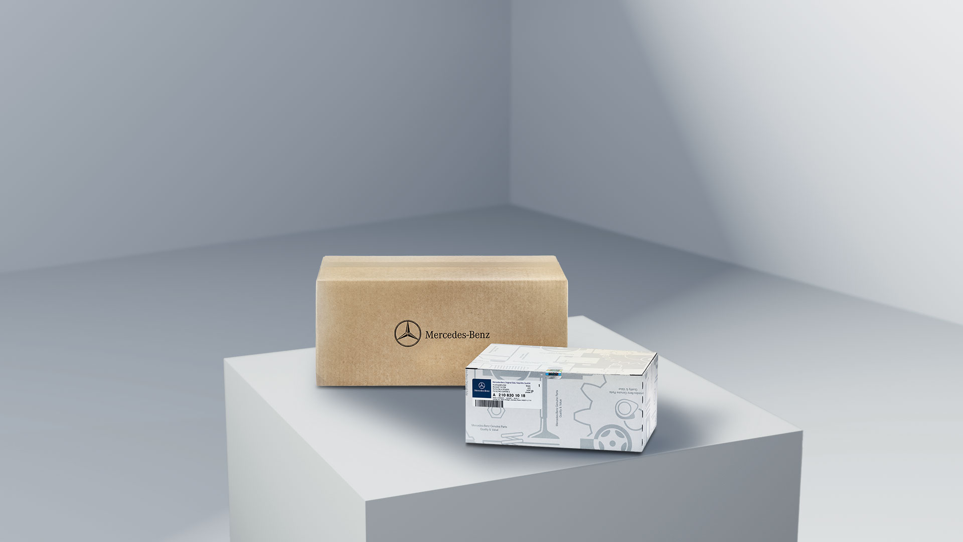 Mercedes-Benz | Maintenance | Genuine Parts Two unopened boxes containing Mercedes-Benz Genuine Parts.