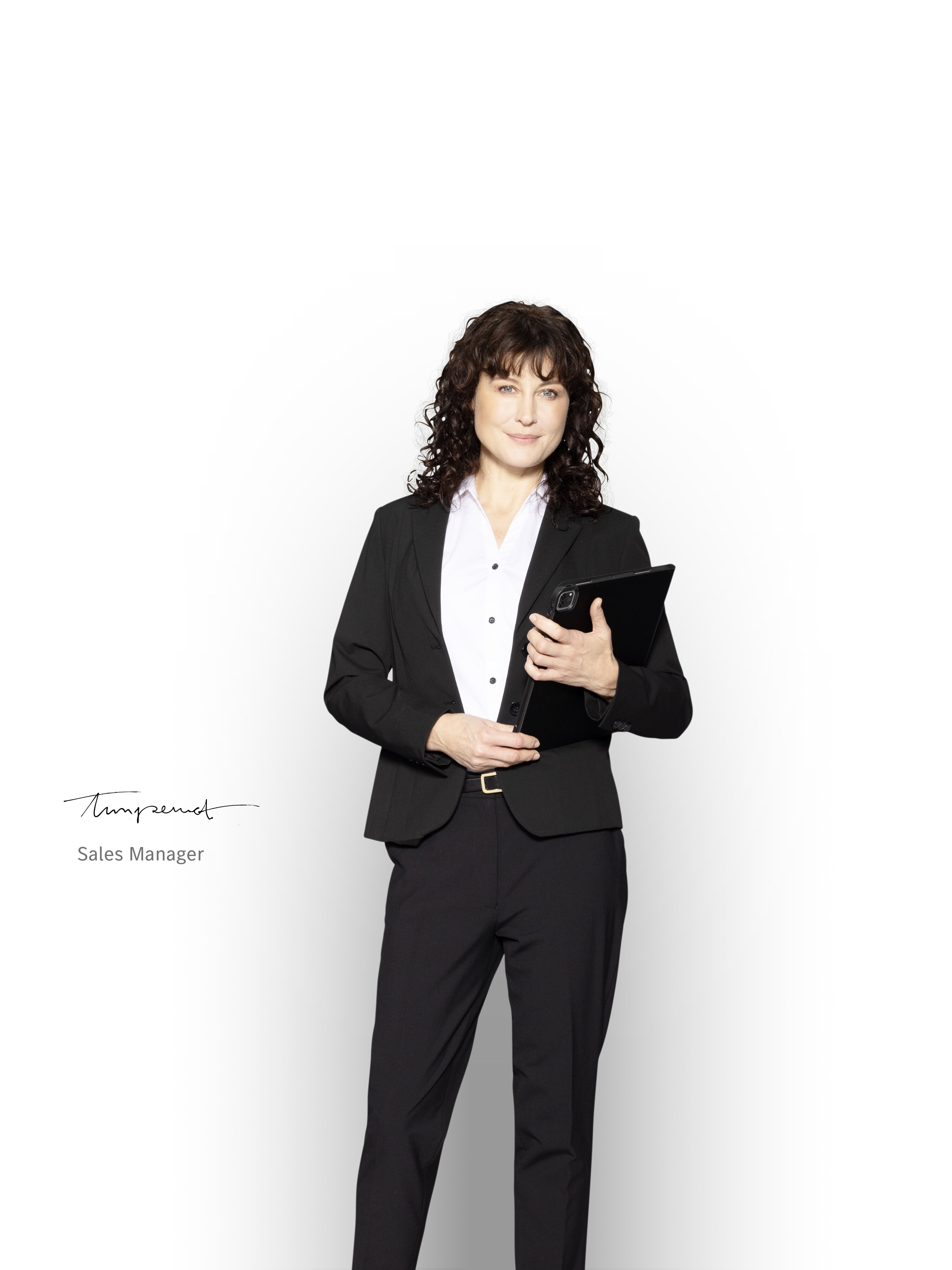 Mercedes-Benz Sales Manager with a tablet ready to inform about the service packages.