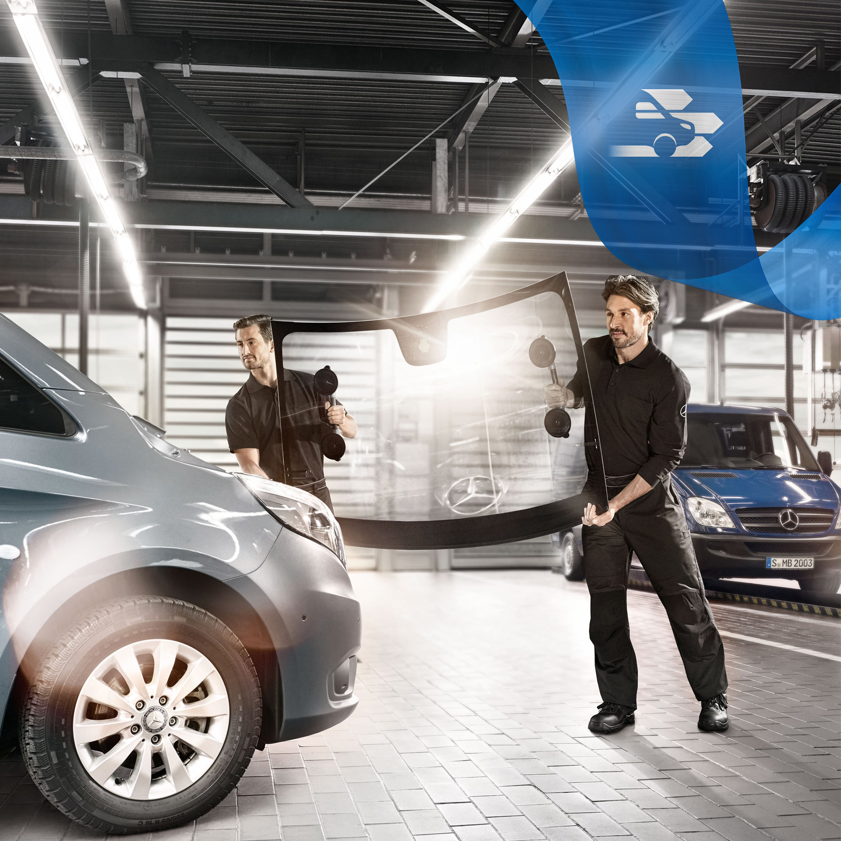 Mercedes-Benz | Repair New windscreen being fitted on a grey sliver Mercedes-Benz Vito van.