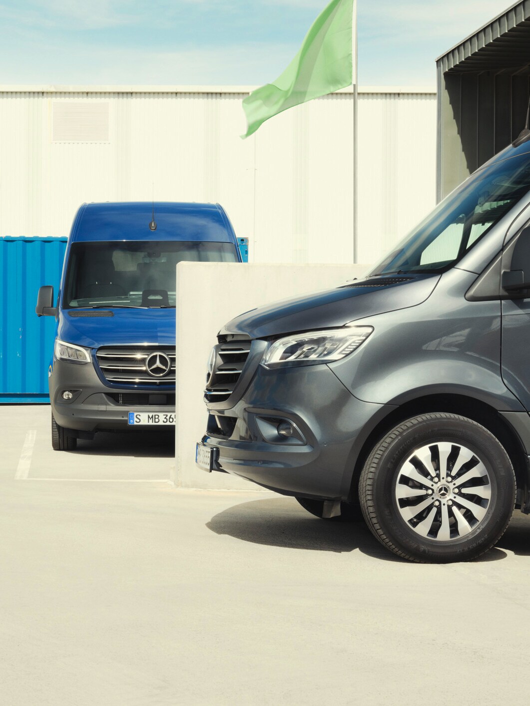 Two Sprinter models standing in a parking space. 