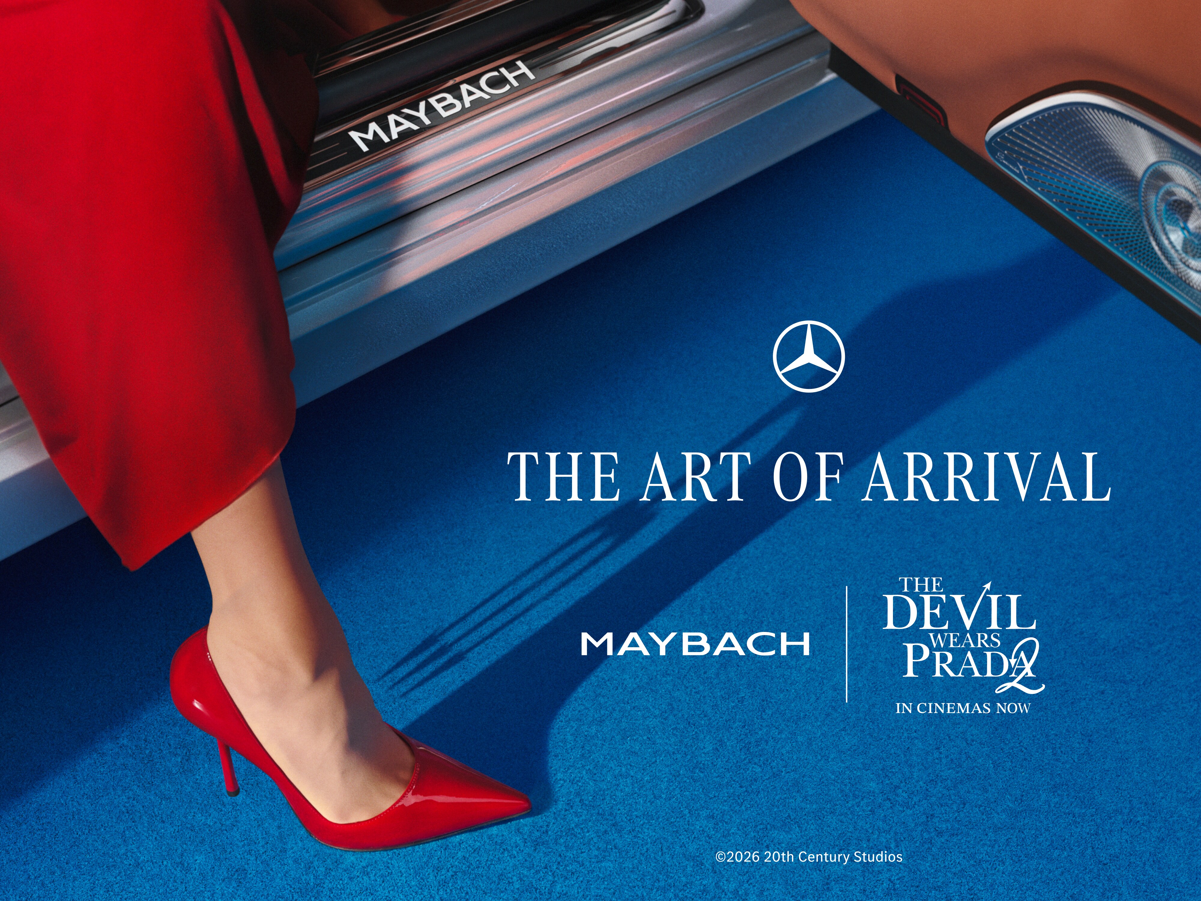 Woman in red heel stepping out of Mercedes Maybach onto blue carpet