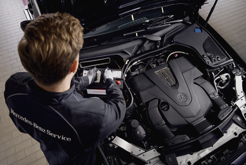 Mercedes-Benz genuine on-board power supply batteries A Mercedes-Benz technician checks the vehicle's electrical system battery.