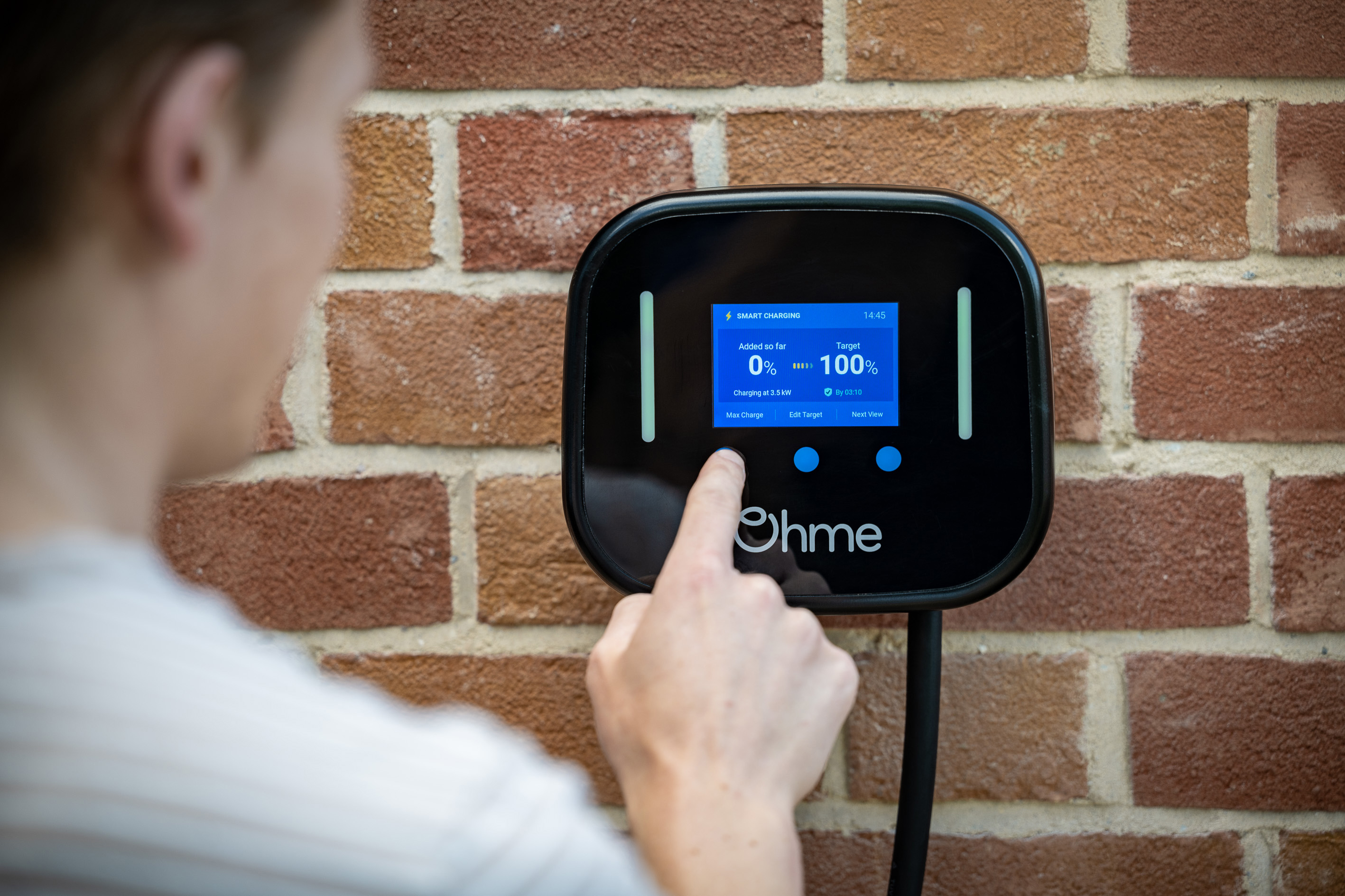 Ohme Ohme EV charging box on brick wall