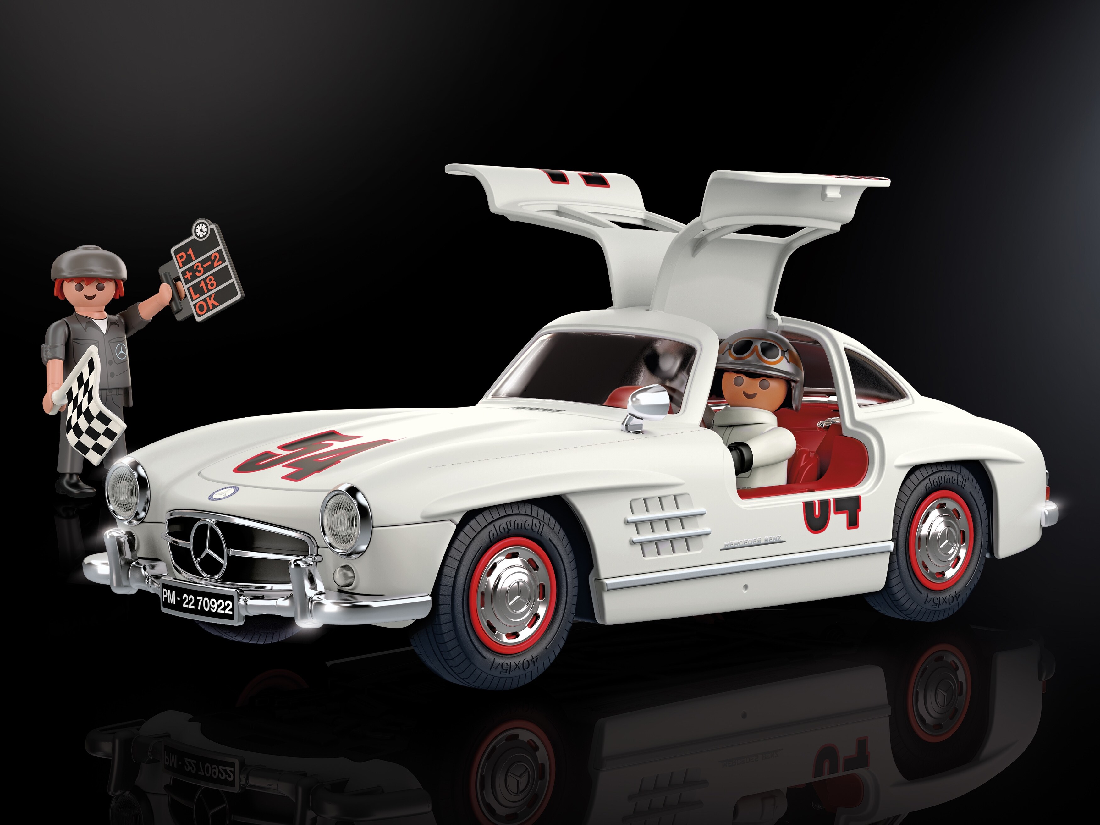 The open gullwing doors of the classic 300 SL model reveal a passion for detail.