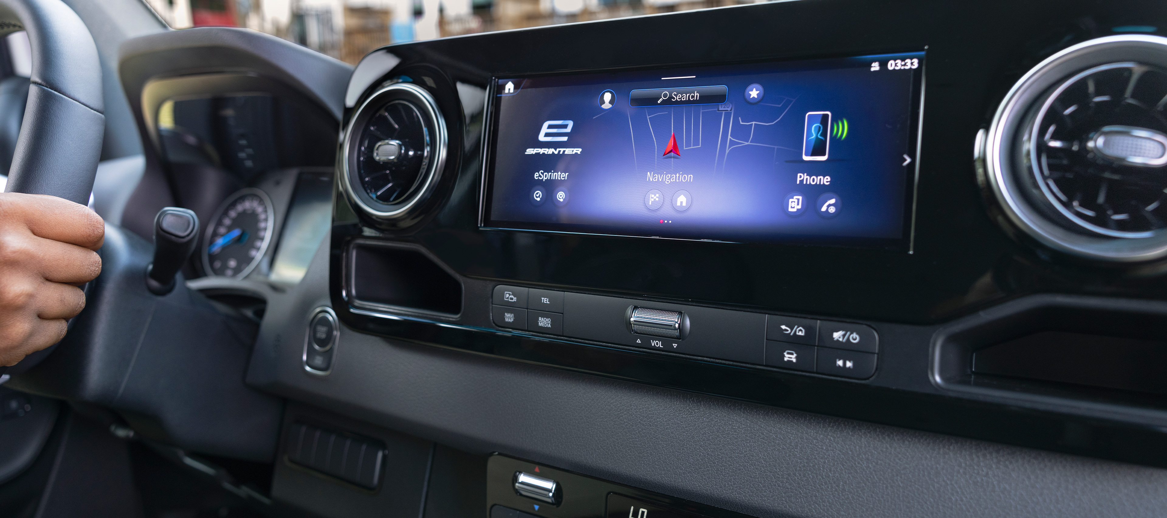 MBUX Infotainment System Screen on eSprinter | Mercedes-Benz Vans A close-up of the MBUX infotainment system in the Mercedes-Benz eSprinter van.