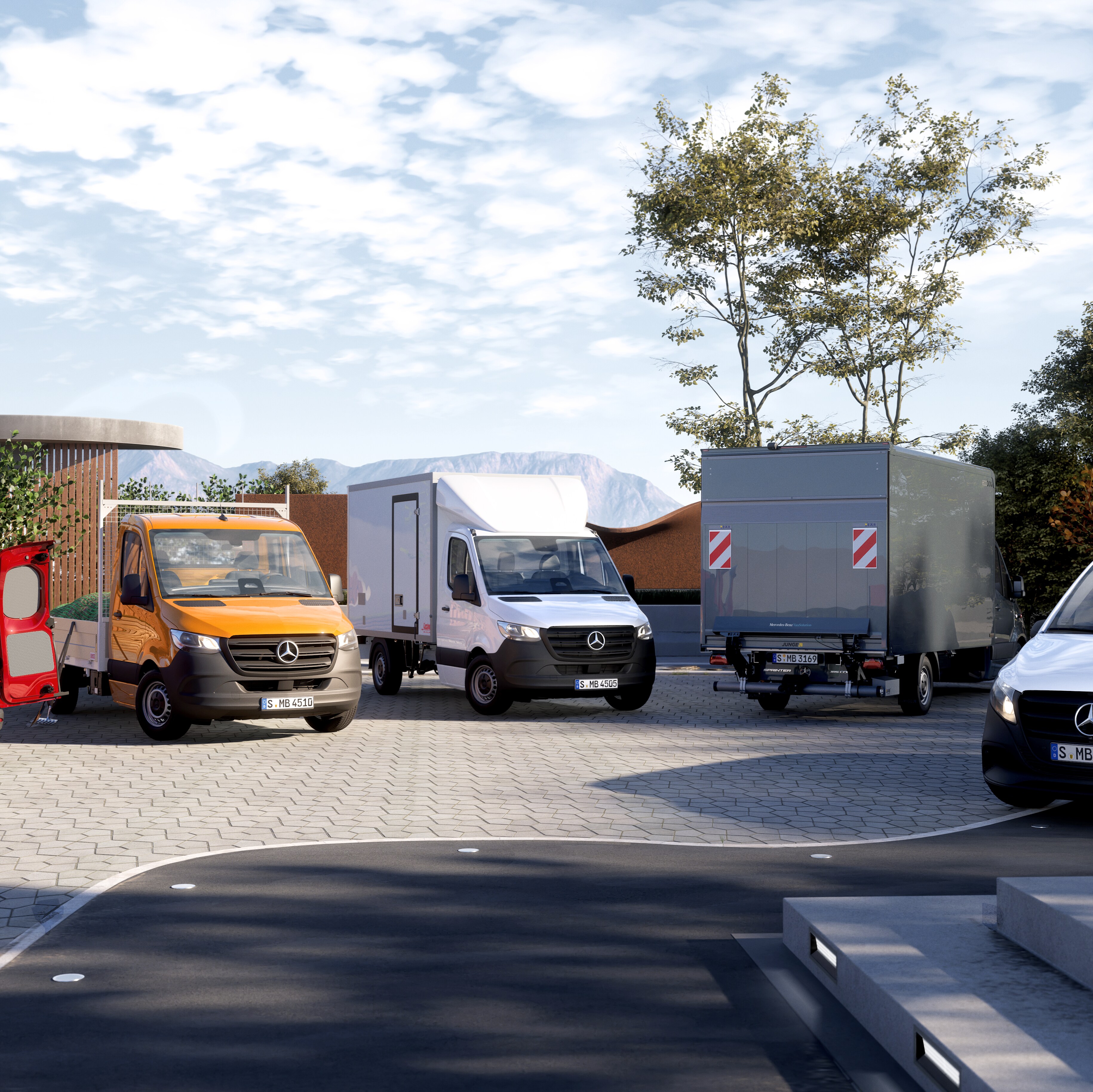 A group of five Mercedes-Benz vans in different colours and body styles parked outdoors.