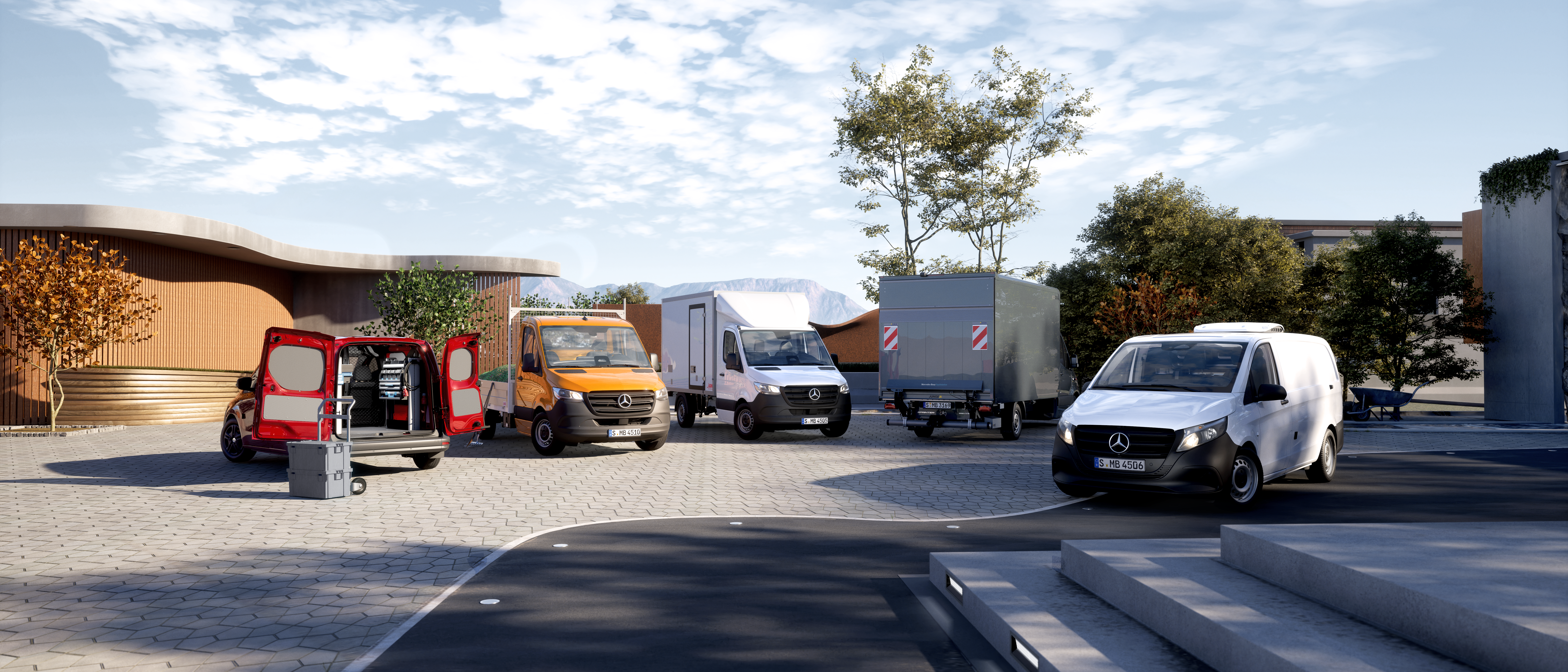 A Group of Mercedes-Benz Vans Parked Outdoors | Mercedes-Benz Vans A group of five Mercedes-Benz vans in different colours and body styles parked outdoors.