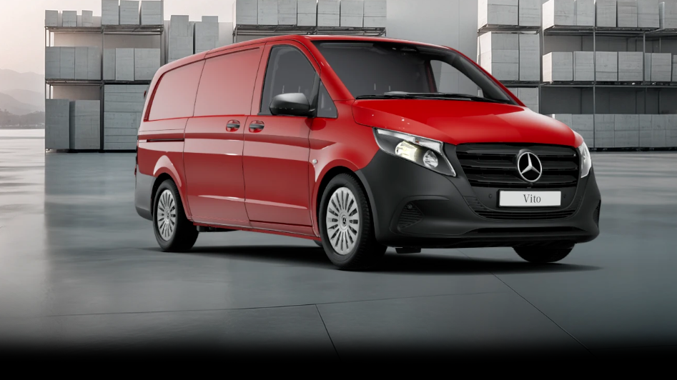 White Mercedes-Benz Vito Panel Van parked by modern concrete structure.