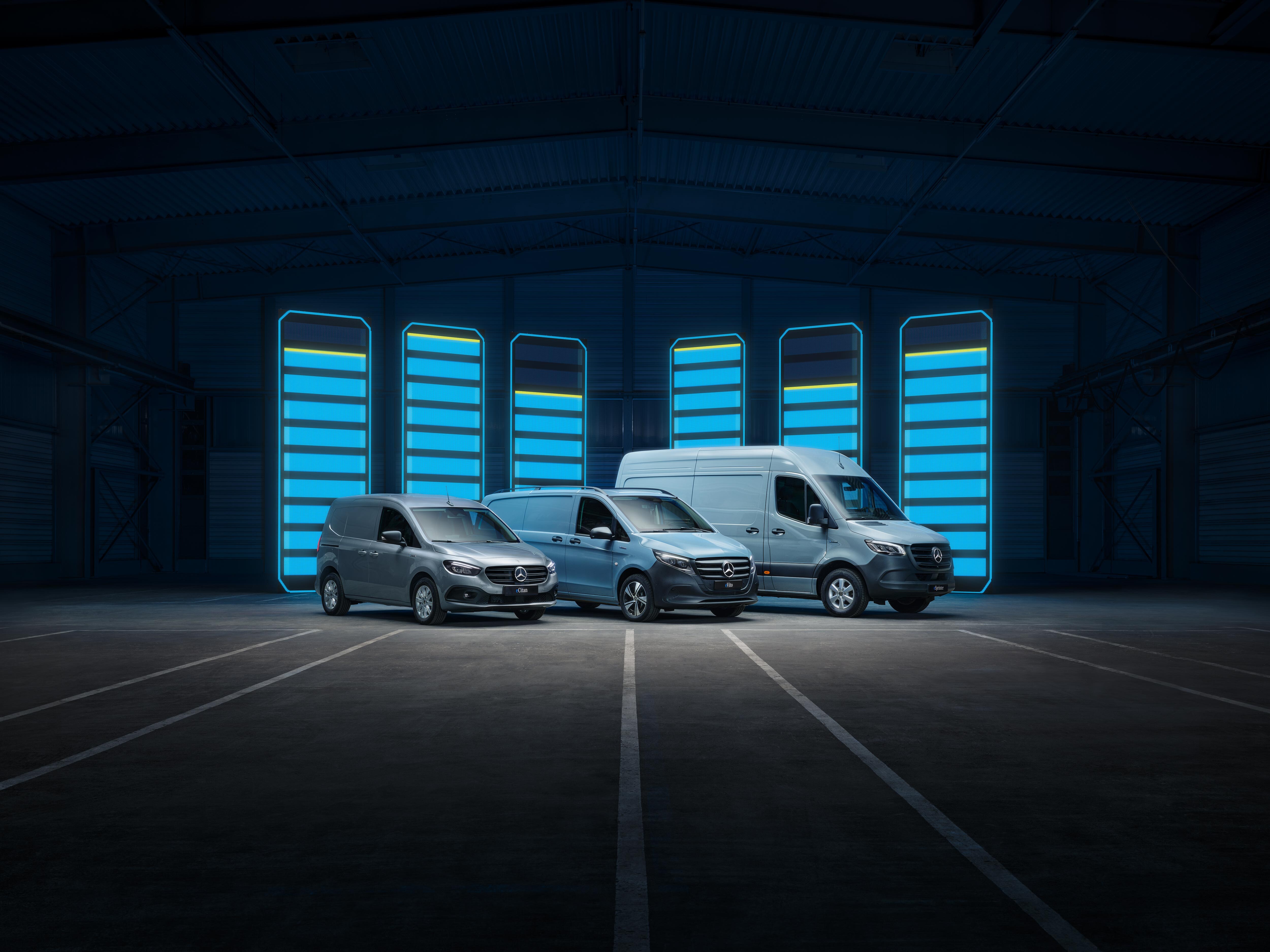 Mercedes-Benz eCitan, eVito and eSprinter electric vans parked in front of a battery charging graphic.