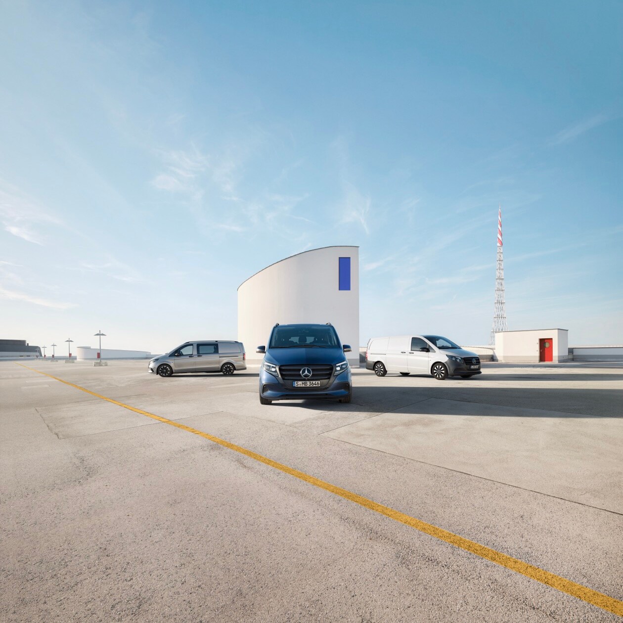 Mercedes-Benz Vito range, displayed in an industrial setting, featuring the Vito Tourer, Vito Panel Van and Vito Crew Van. 