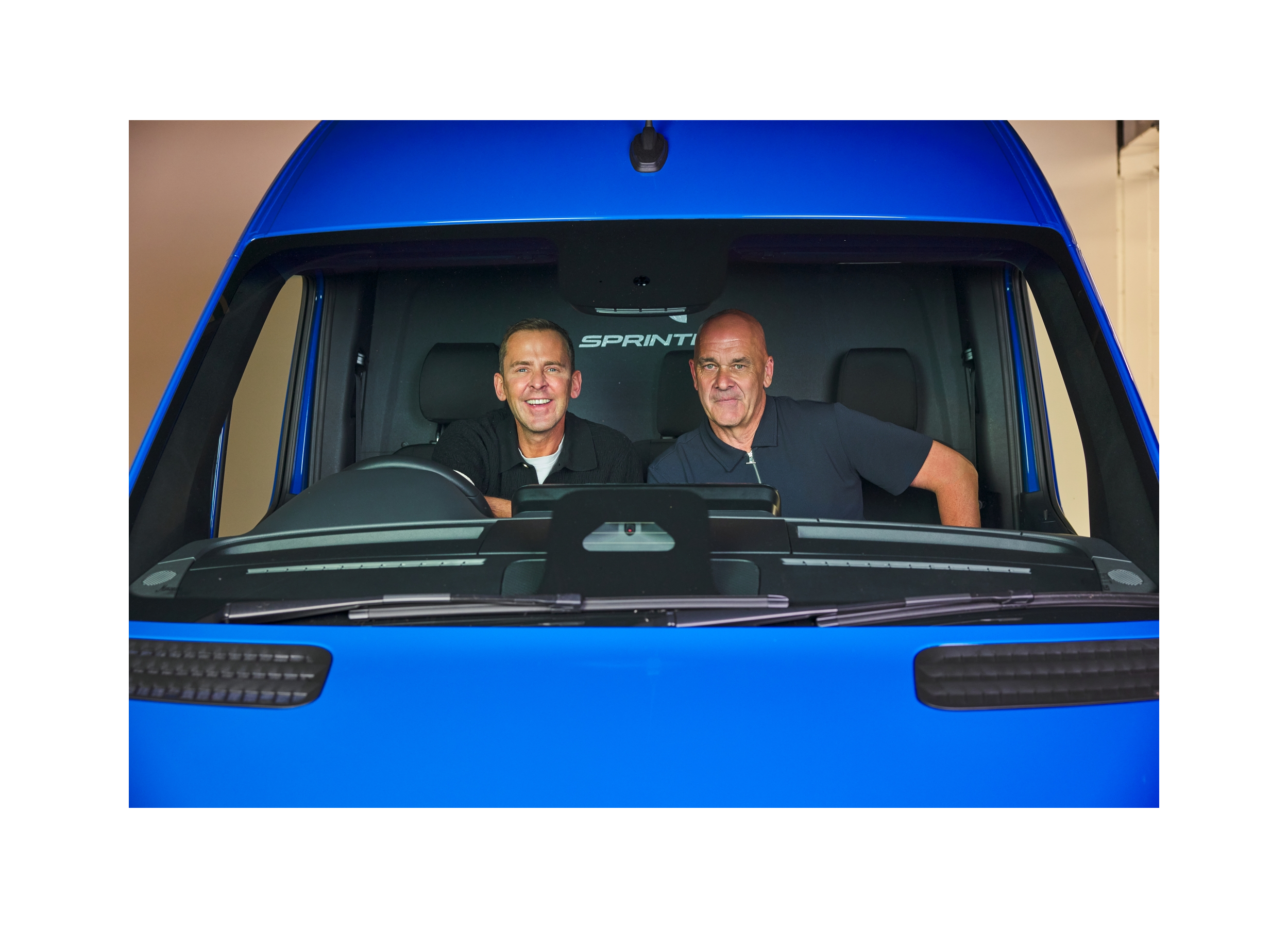 David Curtis in a blue Sprinter Van David Curtis in a blue Sprinter Van