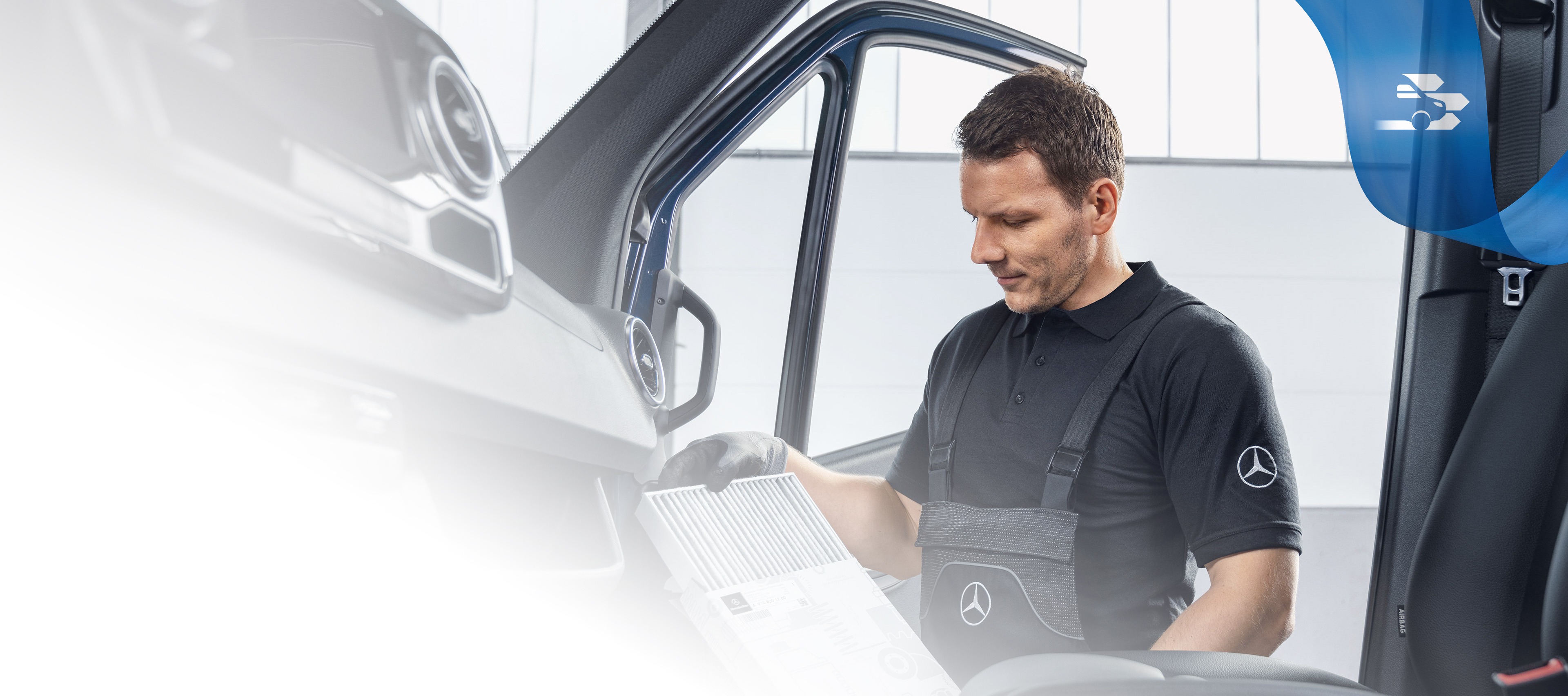 Mercedes-Benz | Vans Quality GenuineParts Mechanic checking Mercedes-Benz GenuineParts inside the van.